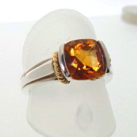 JCSJCS1388: If you like gold or have a sunny disposition, then this cushion shape yellow-gold Citrine stone set in a sterling silver ring is just the ticket. Accented in 18kt yellow gold. SOLD