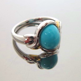 JCSJCS1385: The cabochon cut gem quality Turquoise in this sterling ring is a robin egg blue with no veining or other imperfections. SOLD