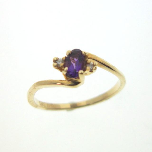 JCSJCS1380: This is a 10kt yellow gold made in the USA ring. It is set with a natural Amethyst gem stone. According to ancient lore you cannot get drunk or be poisoned while wearing an amethyst. SOLD