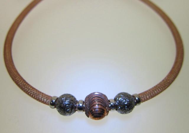 JCSJCS1391: This colorful necklace is sterling  silver with a Rose Gold overlay and with a pair of blacken silver beads.  It measure 17