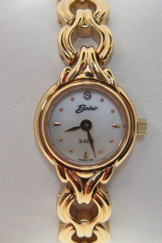 JCSJCS1396: A rare yellow gold on stainless steel AND water resistant to 3Atm dress wrist watch.  Belair, an American watch company.  SOLD
