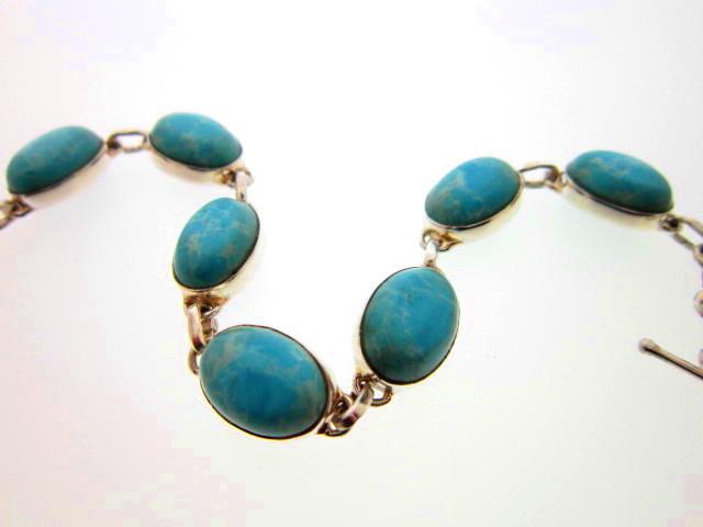 JCSJCS1499: This hand wrought sterling bracelet contains the Caribbean Sea blue Larimar gemstones from the Dominican Republic. NEW LOWER PRICE SOON