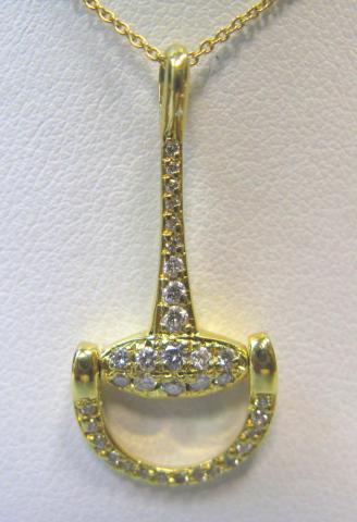 JCSA913: Estate stirrup pendant.  The 18kt. yellow gold pendant has .35cts of diamonds, and one small ruby set on the back..18